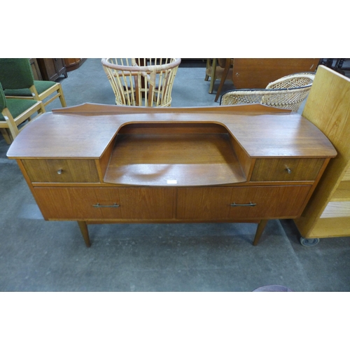 73 - A small teak sideboard