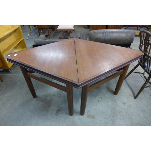 74 - A pair of teak triangular side tables