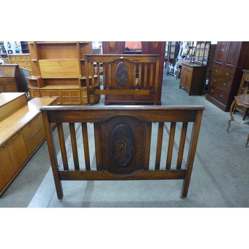 93 - An Edward VII carved oak double bed