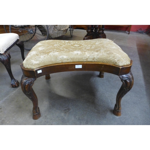 94 - A Victorian walnut footstool