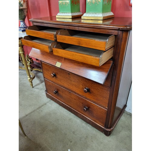 4 - A Victorian mahogany fitted chest of drawers