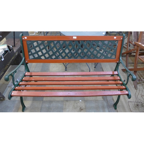 290 - A cast iron ended garden bench