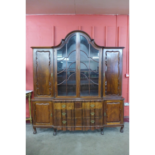 10 - A large George III style walnut dome topped library bookcase