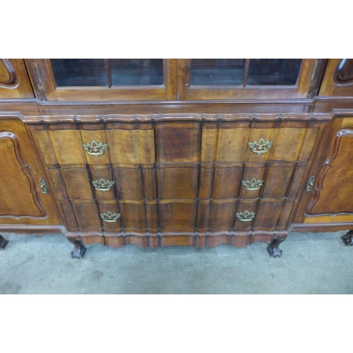 10 - A large George III style walnut dome topped library bookcase