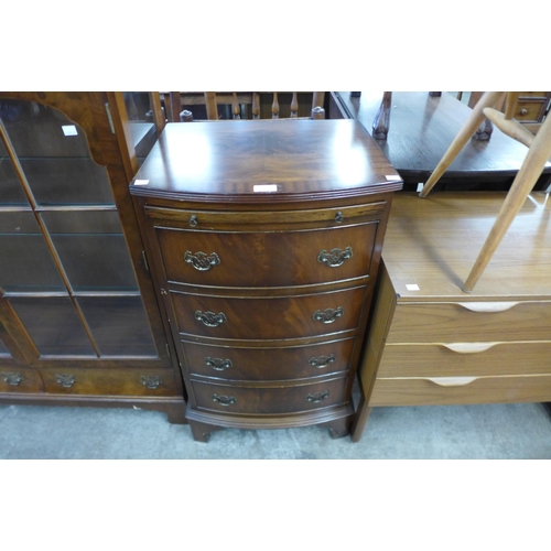 103 - A mahogany bow front chest of drawers