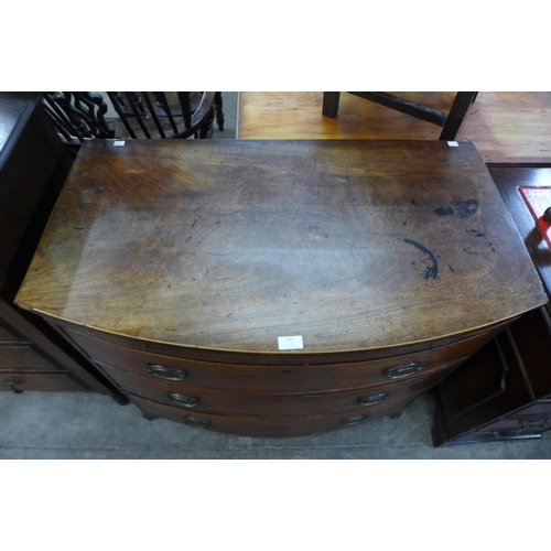 107 - A George III mahogany bow front chest of drawers