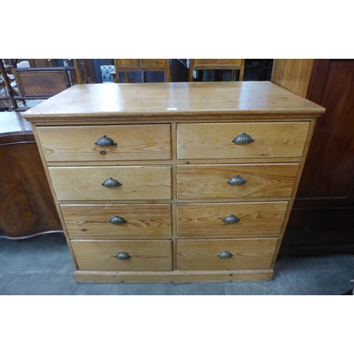 115 - A large Victorian pine chest of drawers