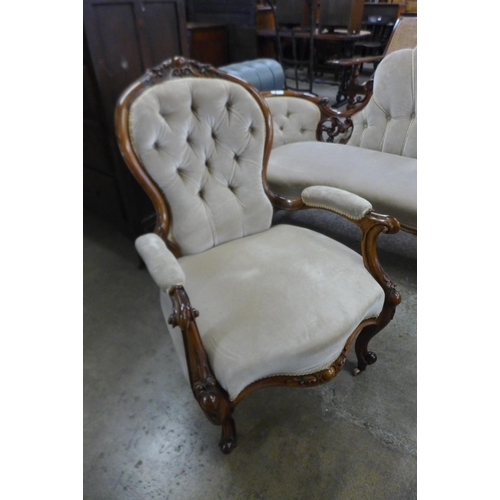 119 - An early Victorian carved walnut and fabric upholstered settee and pair of matching lady's and gentl... 