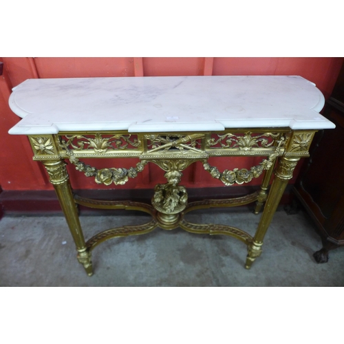 12 - A French Louis XV style carved giltwood and marble topped console table