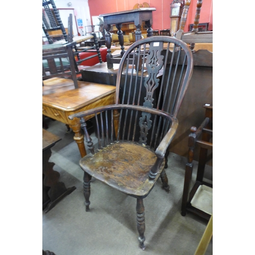 145 - A 19th Century elm and yew highback Windsor chair, attributed to Gabbitas workshop, Worksop, a/f