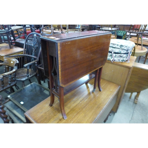 149 - An Edward VII inlaid mahogany Sutherland table