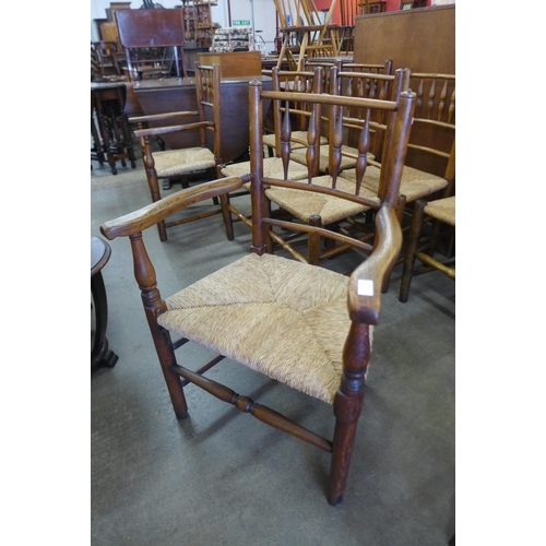 155 - A set of eight George III provincial Yorkshire elm and rush seated chairs