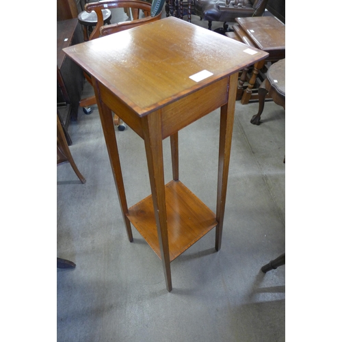 211 - An Edward VII inlaid mahogany jardiniere stand