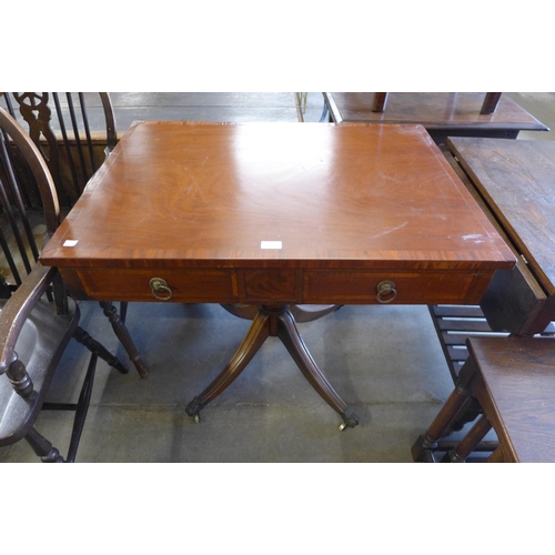 215 - A George IV mahogany two drawer library table