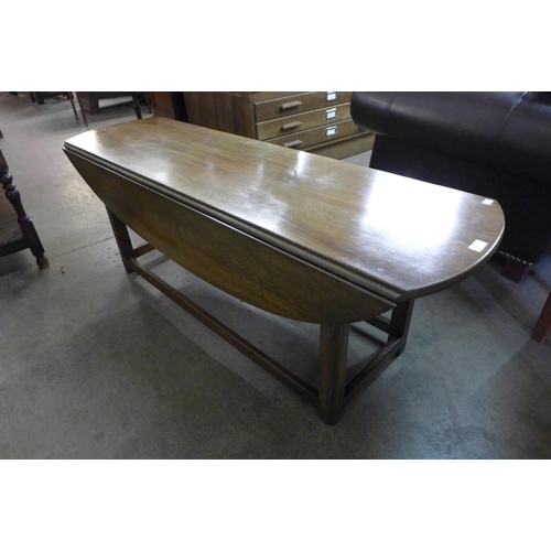 235 - A large mahogany drop leaf coffee table