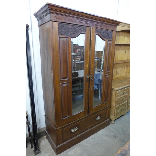 238 - An Edward VII walnut wardrobe