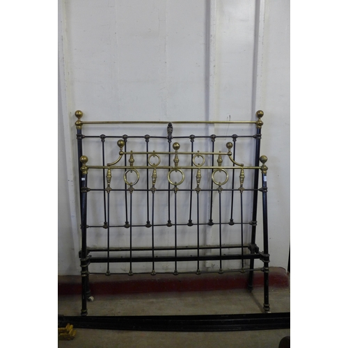 264 - A Victorian cast iron and brass double bed