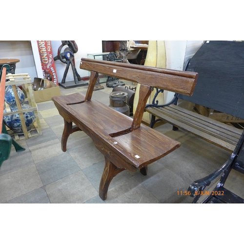 291 - A stained pine platform bench