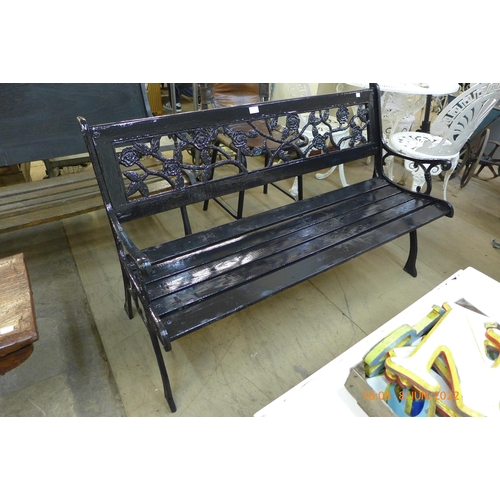 292 - A cast iron ended garden bench