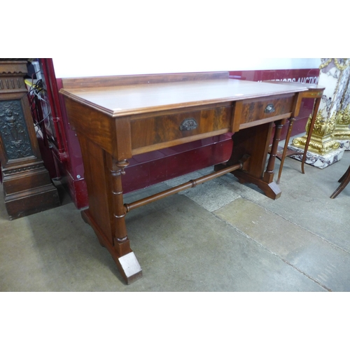 34 - A Victorian mahogany two drawer writing table