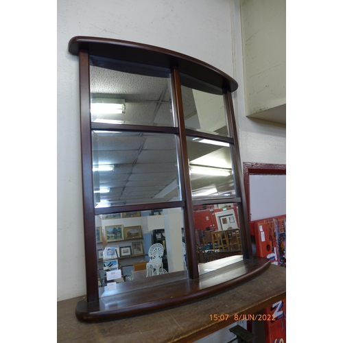 385 - A mahogany cathedral style mirror