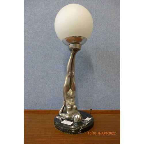 388 - An Art Deco style figural chrome effect table lamp