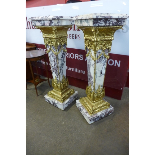 39 - A pair of French Louis XV style marble and gilt metal mounted pedestals