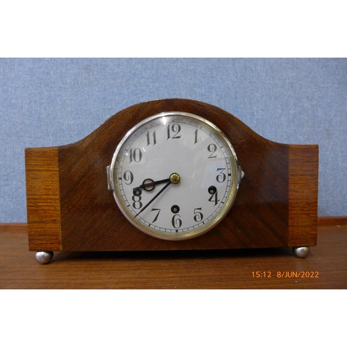 390 - An Art Deco mahogany mantel clock