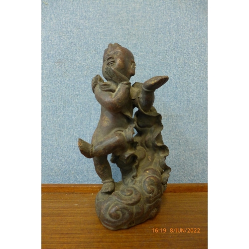 394 - A Chinese bronze figure of a boy