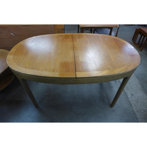 79 - A Nathan teak extending dining table