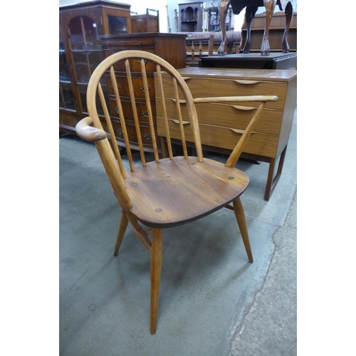 82 - An Ercol elm and beech Windsor armchair