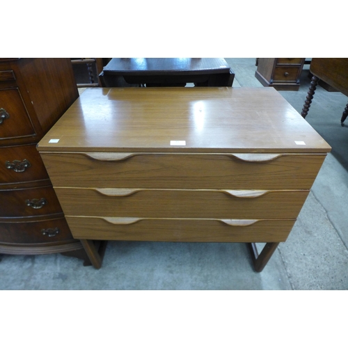 83 - A Europa teak chest of drawers