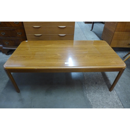 84 - A teak coffee table