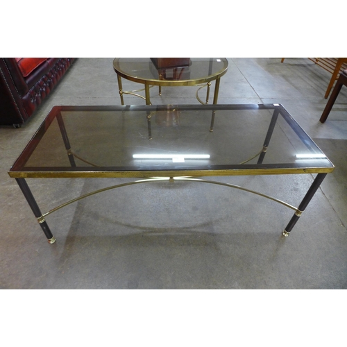 9 - An Italian brass and glass topped rectangular coffee table