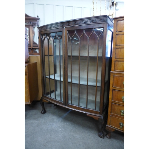 92 - A mahogany bow front display cabinet