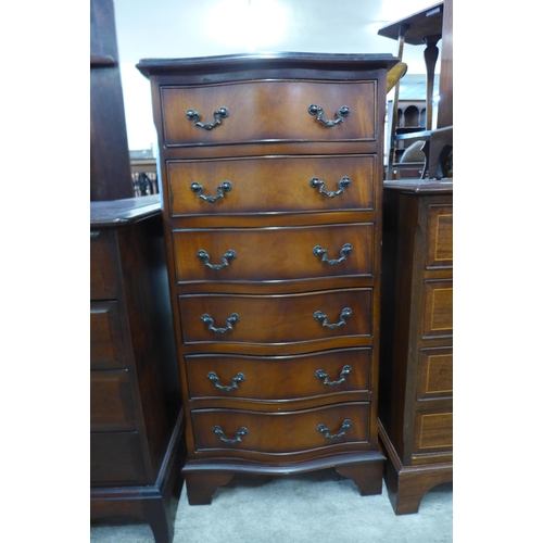 96 - A mahogany serpentine chest of drawers