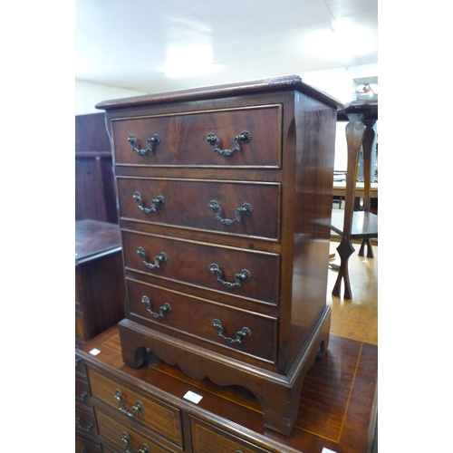 97 - A small mahogany chest of drawers