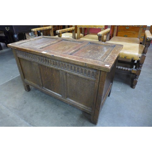 23 - A William III carved oak coffer