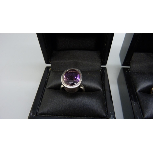 1000 - Three silver and amethyst rings