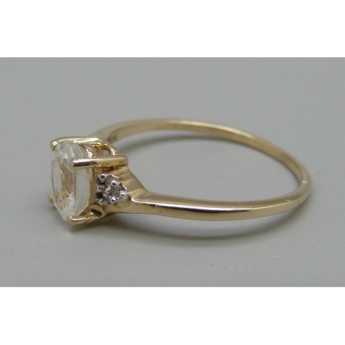 1007 - A 9ct gold rock crystal and six diamond ring, 2.0g, Q