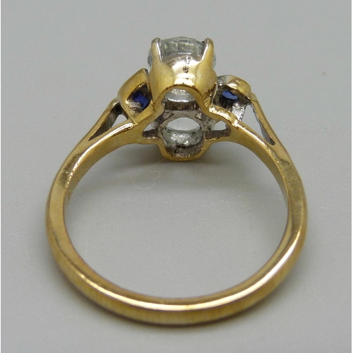 1013 - A topaz and sapphire quatrefoil silver-gilt ring, L