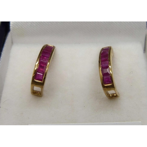 1022 - A pair of 9ct gold ruby earrings, 1.5g, boxed