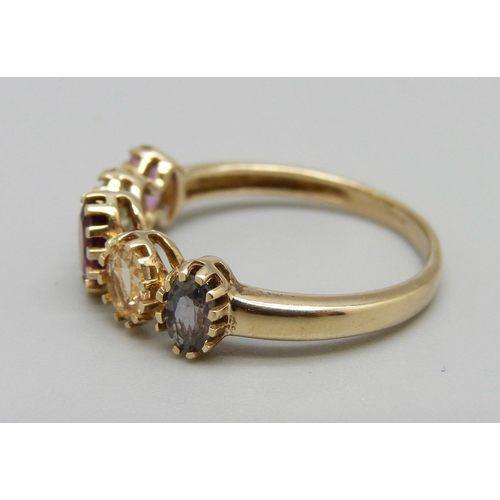 1042 - A 9ct gold multi gemstone ring 2.8g, S