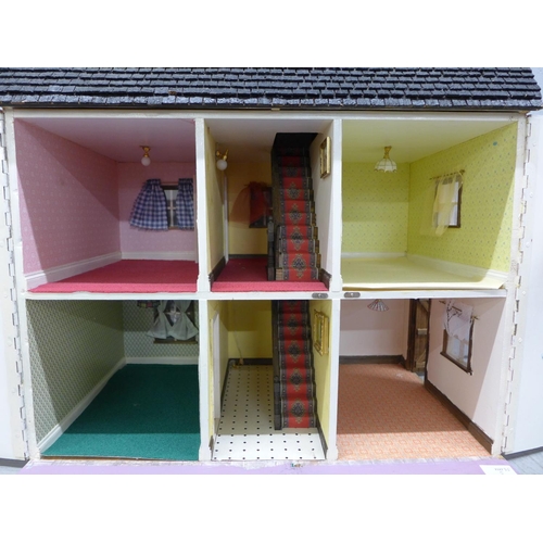 1057 - A 1970's/1980's wooden dolls house with electrics **PLEASE NOTE THIS LOT IS NOT ELIGIBLE FOR POSTING... 