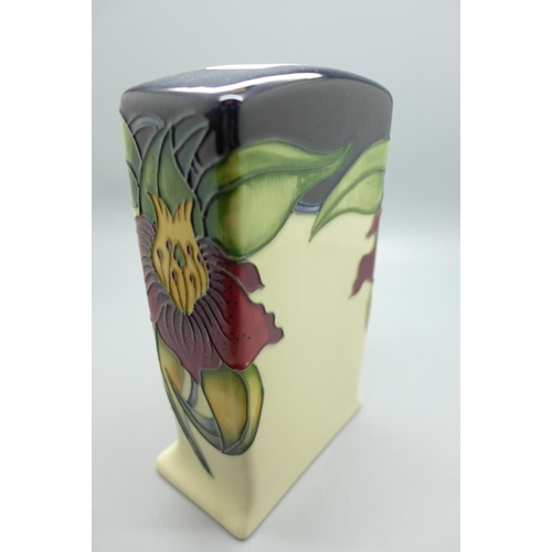 615 - A Moorcroft Anna Lily clock, 15cm