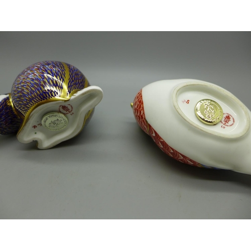 634 - Two Royal Crown Derby paperweights, a badger and pheasant, both with stoppers