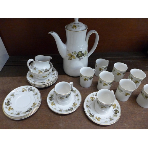 668 - A Royal Doulton Larchmont coffee set, including nine cups, nine saucers, a sugar bowl, milk jug and ... 