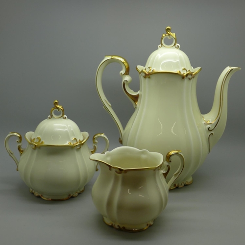 669 - A Hehscherzer three piece tea service