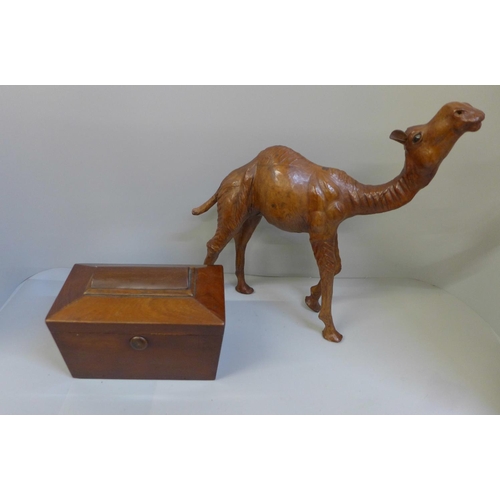 673 - A Liberty of London leather model of camel (stamped) and a Georgian sarcophagus wooden tea caddy