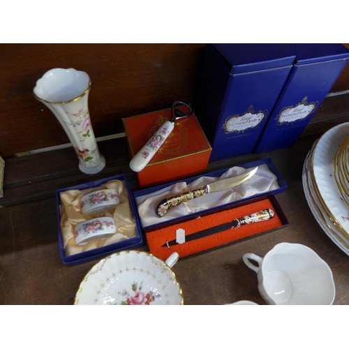 677 - Royal Crown Derby china; cups, plates and a bottle opener, some boxed